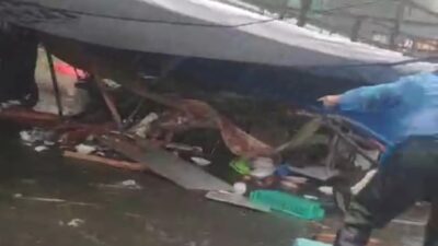 Papan Reklame Caleg DPR RI Ambruk dan Timpa Tukang Sate Akibat Hujan Angin di Bogor